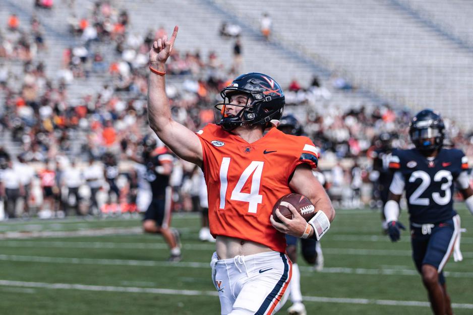Candid photo of Davis Lane Jr. on the field of the spring game
