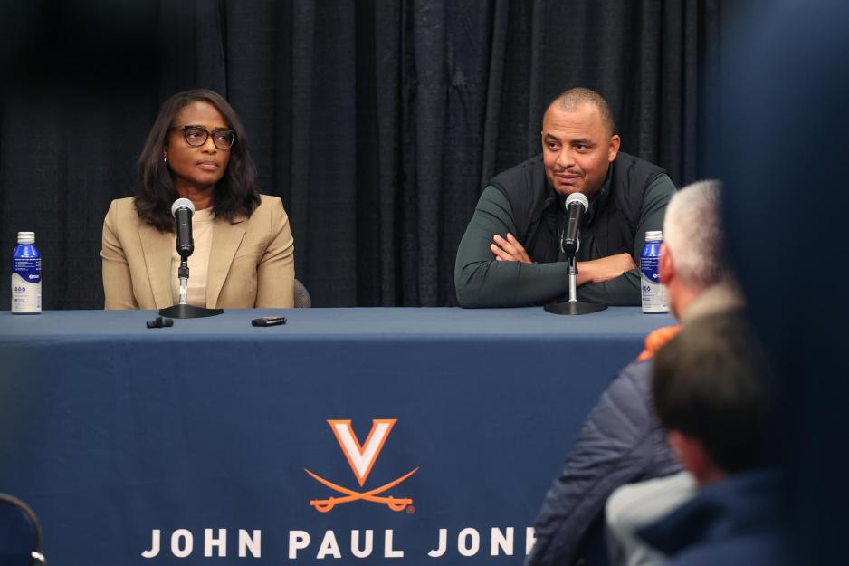 Carla Williams and Tony Elliott at a press conference in John Paul Jones Arena