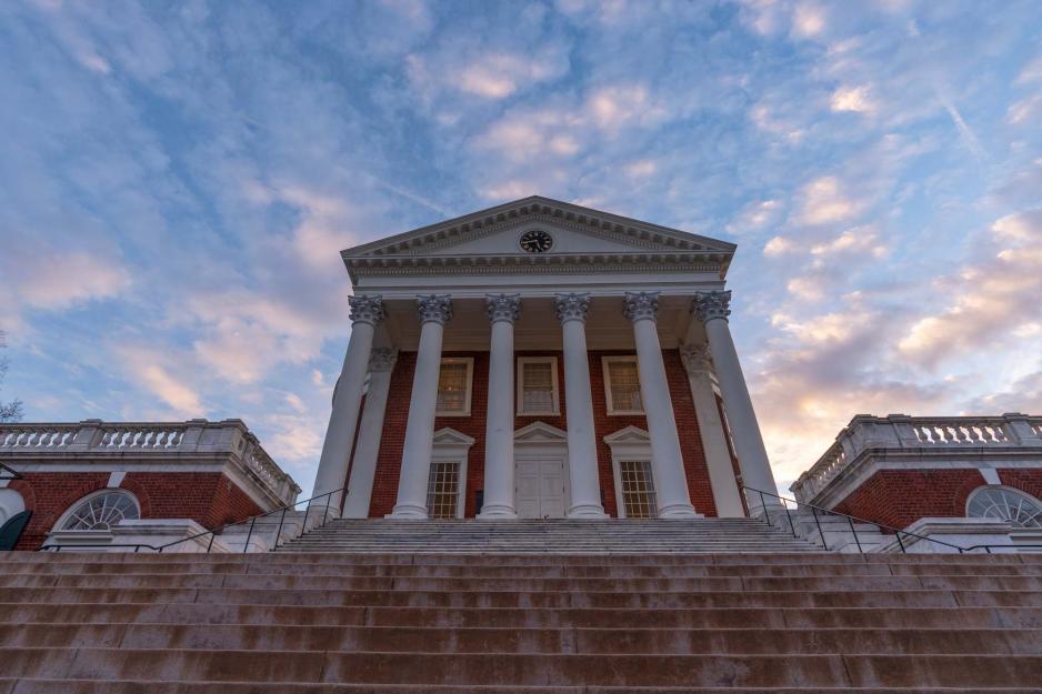 View of the Rotunda from the base of the stairs at sunset on the Grounds of University of Virginia