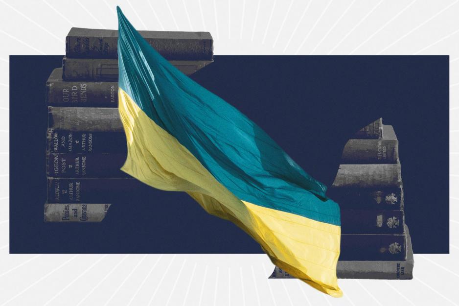 Ukraine Flag over top of stacks of books