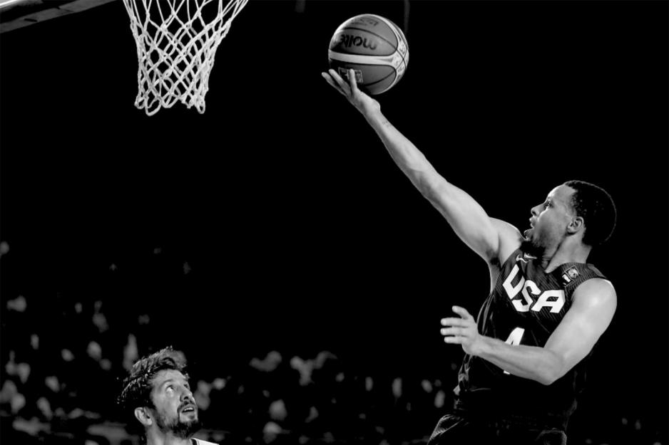 Stephen Curry doing a layup in a game