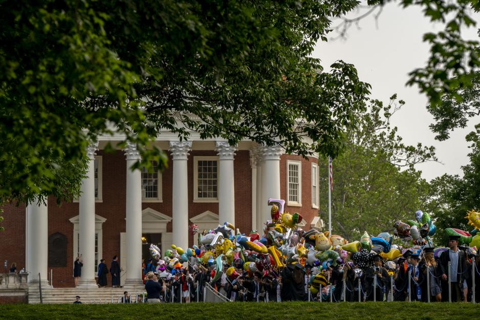 Rotunda procession of graduates with balloons at Final Exercises
