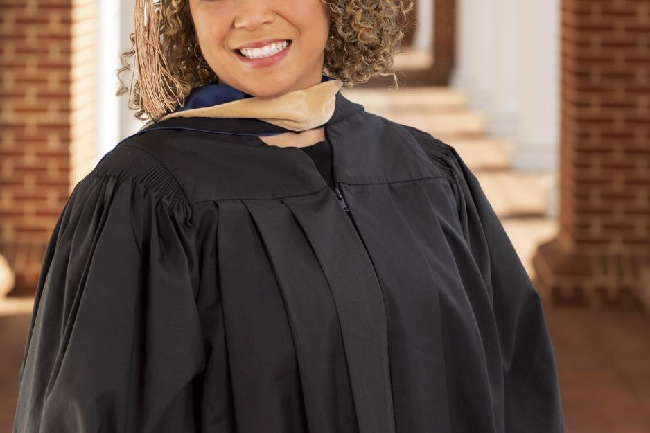 Aja Sae-Kung  headshot in her cap and gown