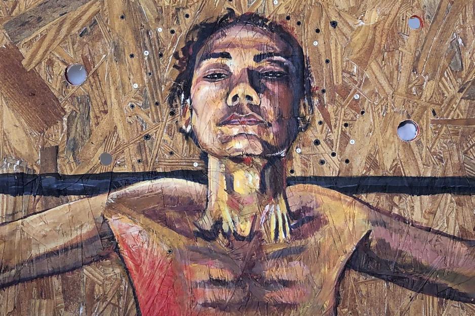 Sally Binard Painting and a person with arms stretched to their sides