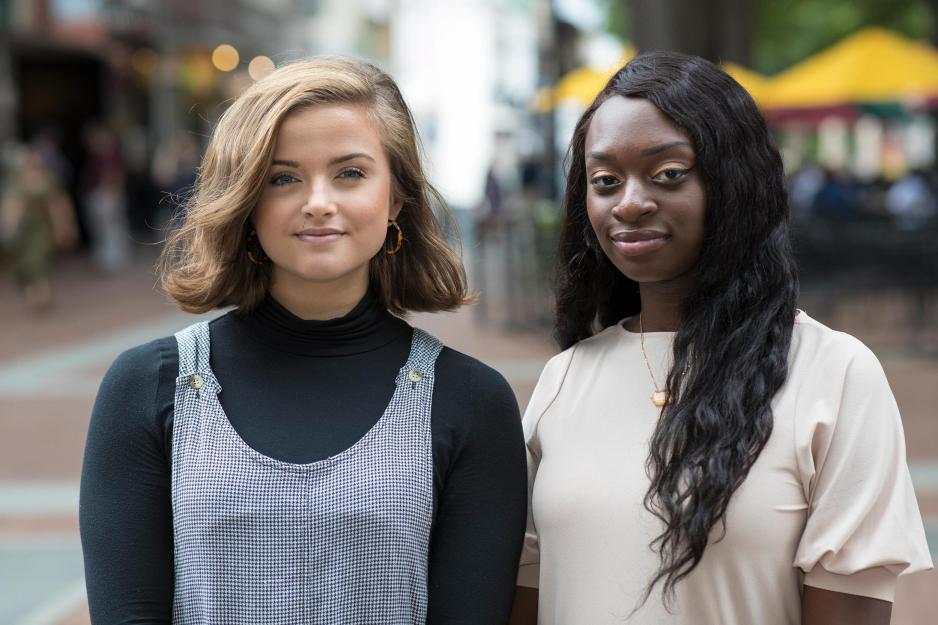Ali Sullivan, left, and Norah Mulinda, right stand together for a headshot