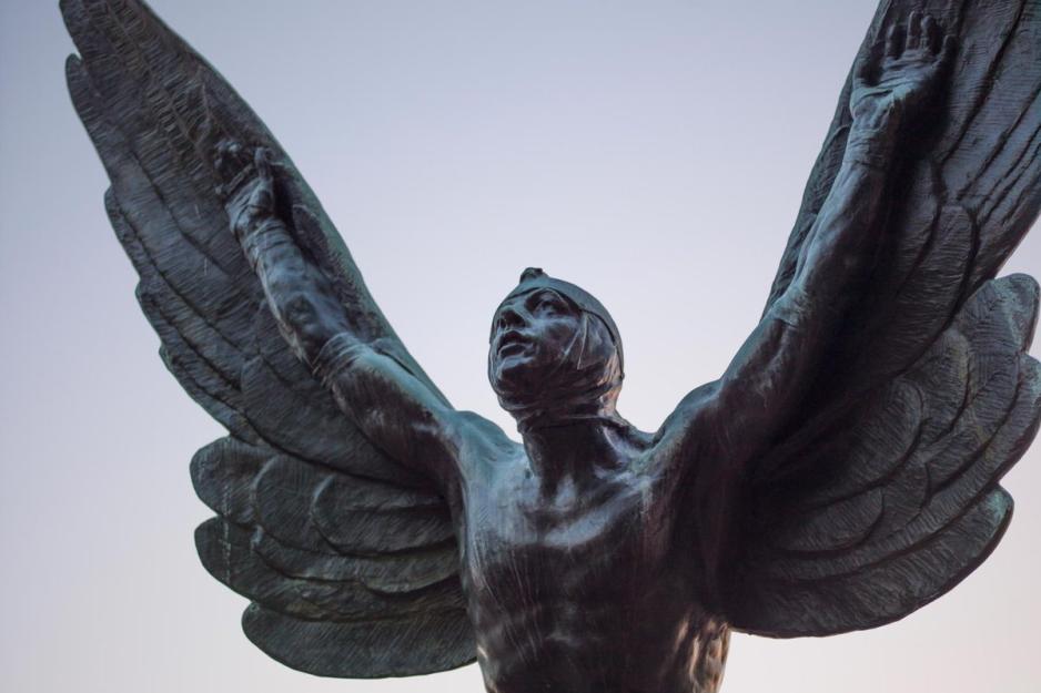 Flying man statue