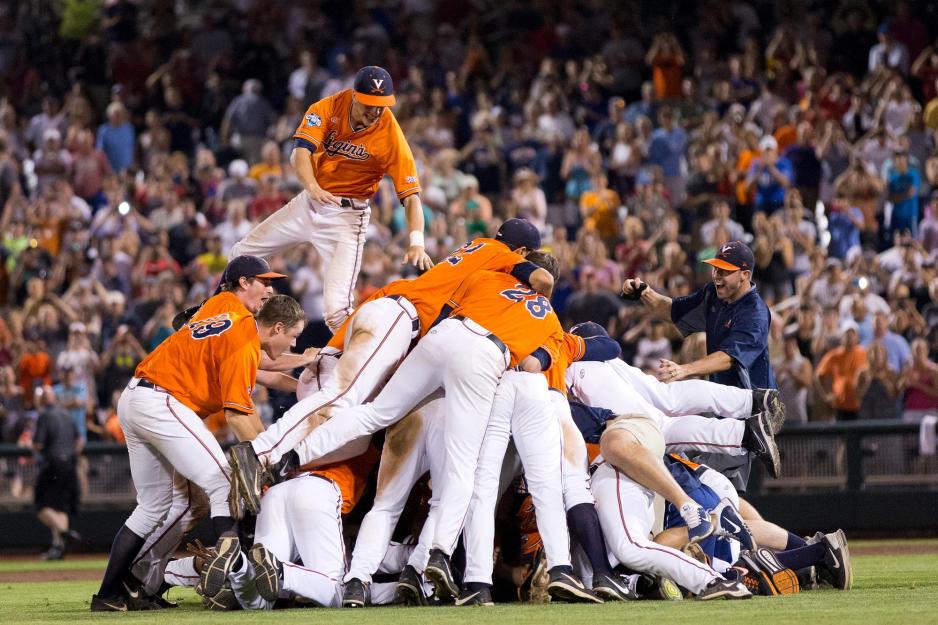 UVA baseball team create a pile on on the field after victory