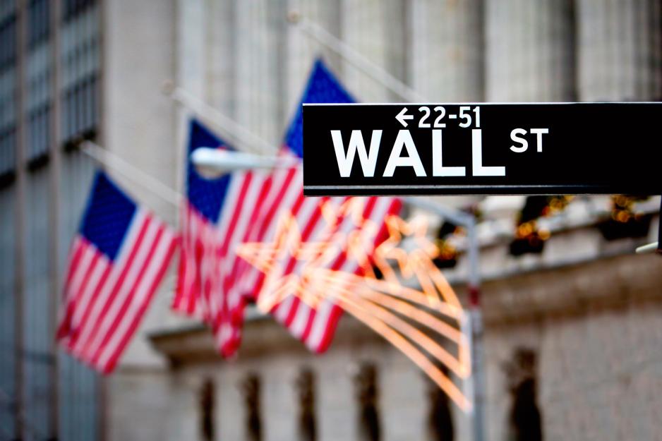 Road sign that reads Wall St