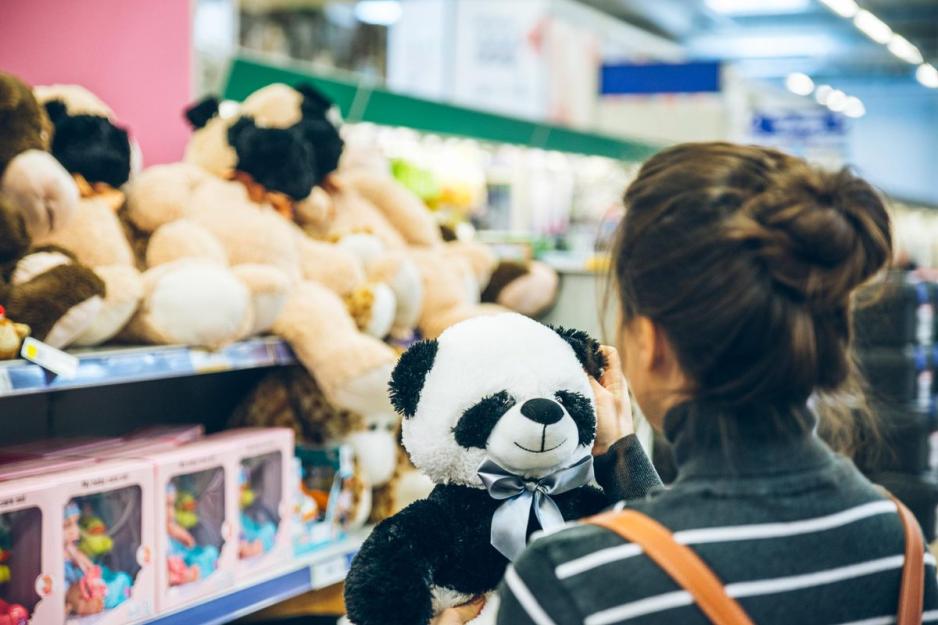 Liz Horton picks up a stuffed panda