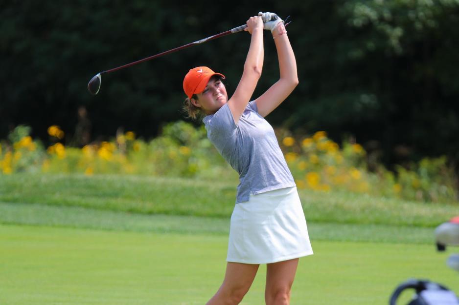 Britney Mangan golfing