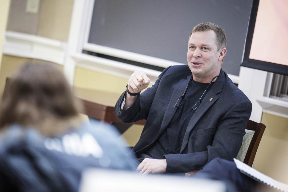 Bronco Mendenhall talking to a group of students