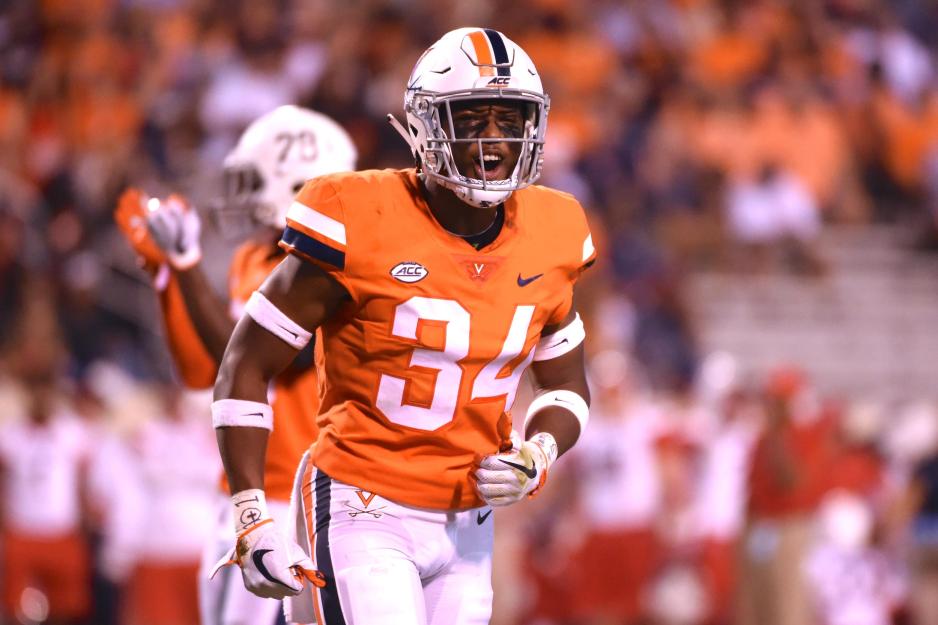Bryce Hall running on the football field