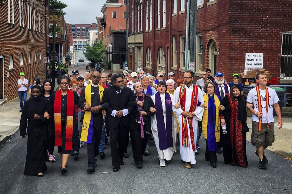 Local Religious leaders walking arm in arm at the counter protest in Charlottesville