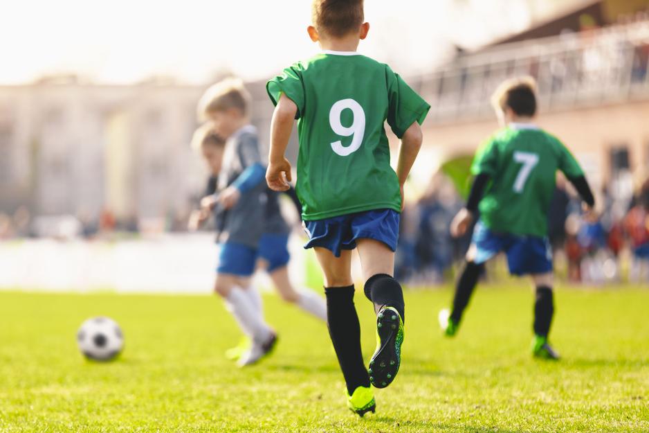 Children playing soccer