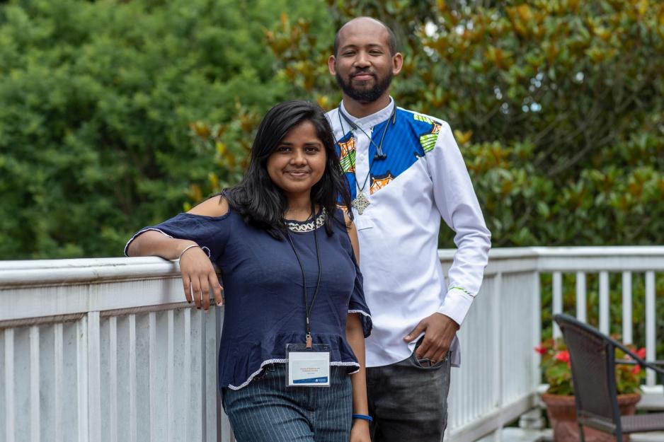 Gayatri Kumari, left, and Ephrem Woldeyesus, right stand together for a picture