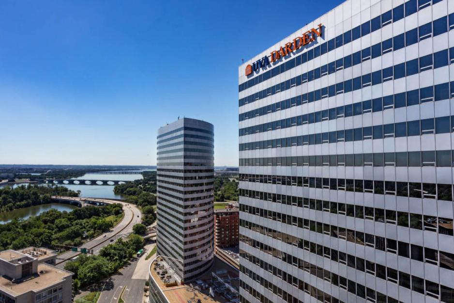 31 story building that has sign that reads UVA Darden