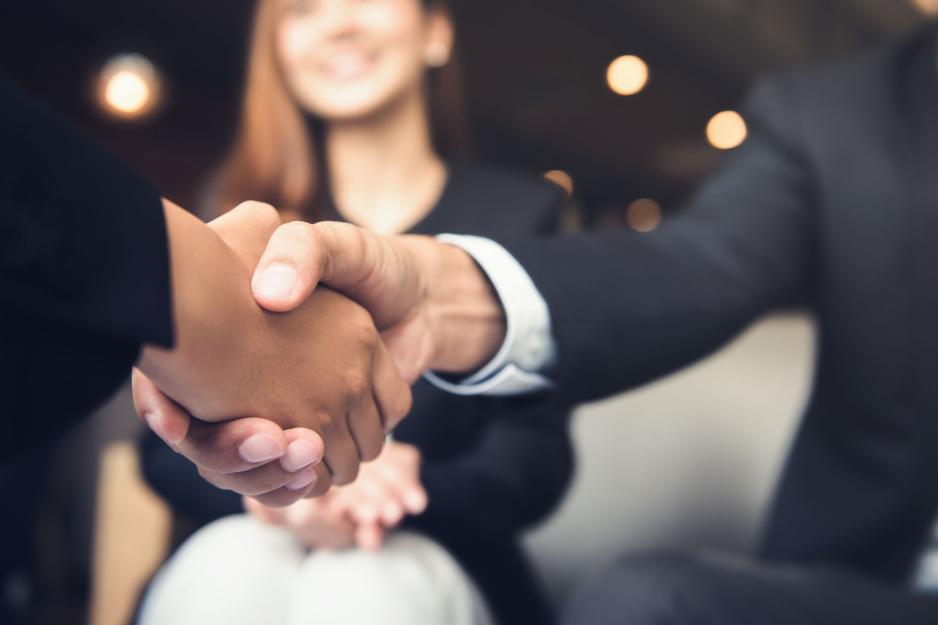 Two people shaking hands