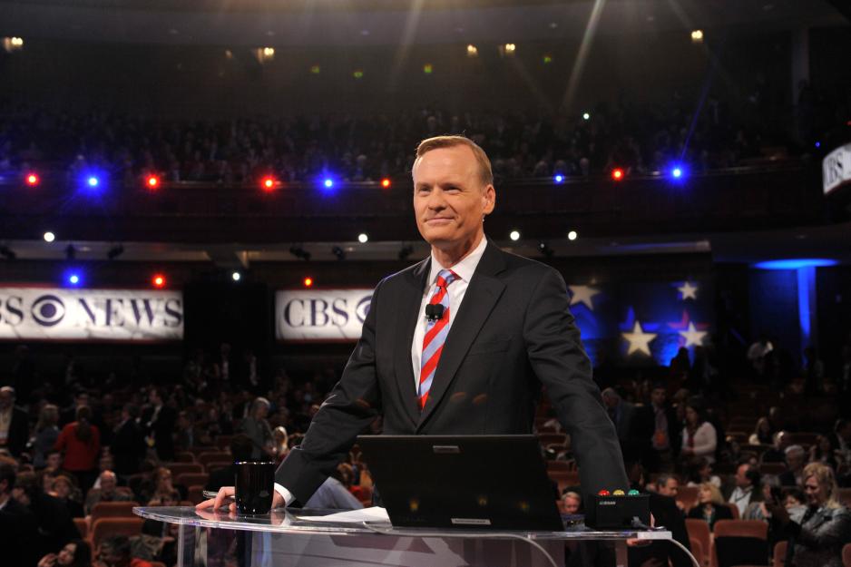 Dickerson stands at a podium