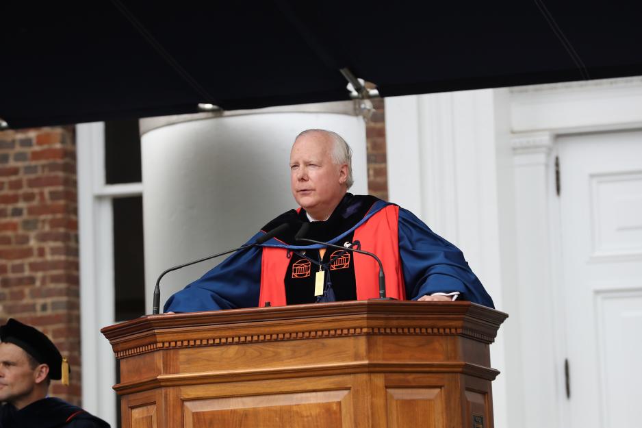 UVA Rector Rusty Conner stands at the podium giving a speech