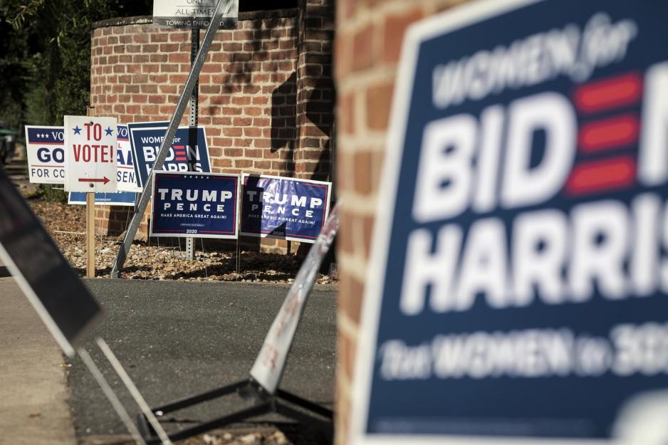 Candidate campaign signs outside of a polling station