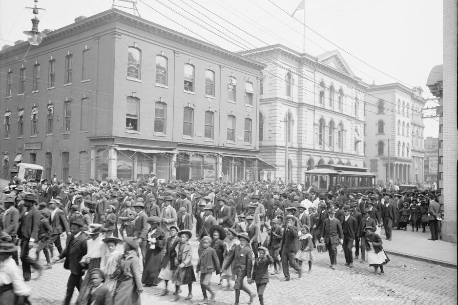 Black and white photo of streets filled on emancipation day