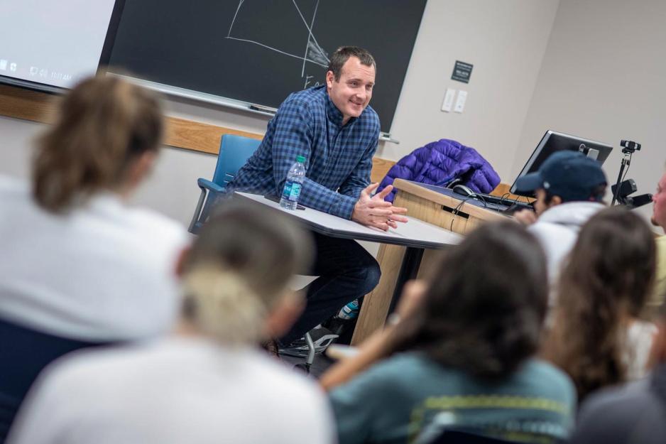 Heath Miller talks to a class full of people