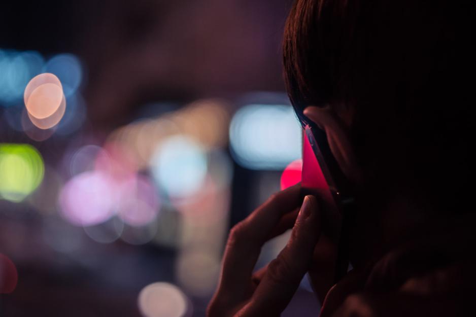 person holding a phone to their ear