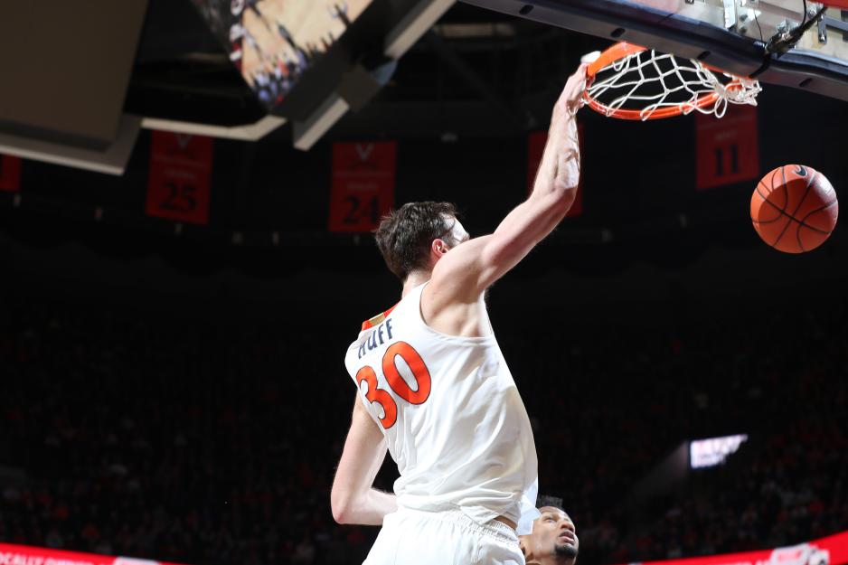 Jay Huff dunking the basketball during a game