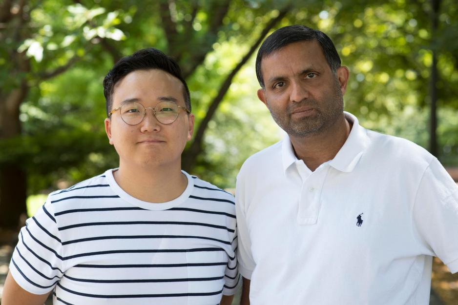 Hyunglok Kim, left, and Venkataraman Lakshmi, right, stand together for a headshot