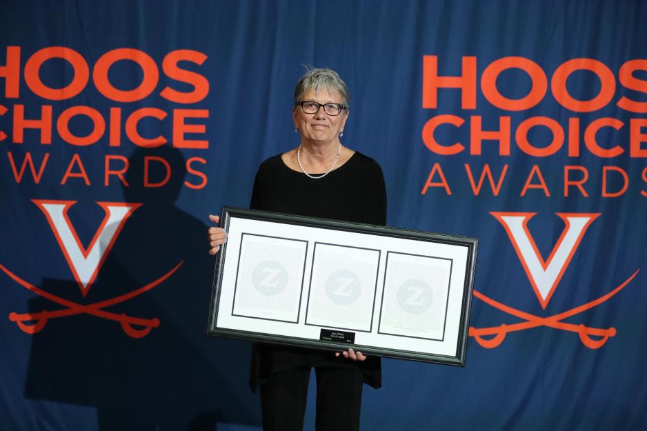Jane Miller holding a picture frame