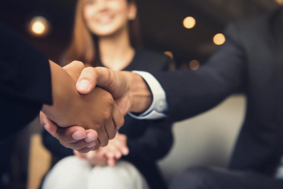 Two people shaking hands