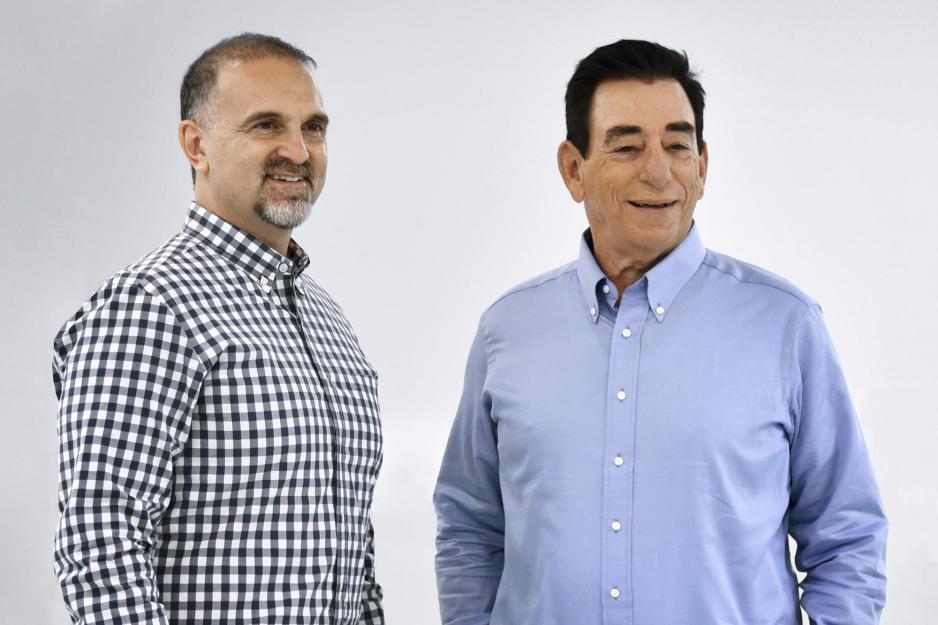 George Yancopoulos, left, and Dr. Leonard Schleifer, right, pose for a picture together