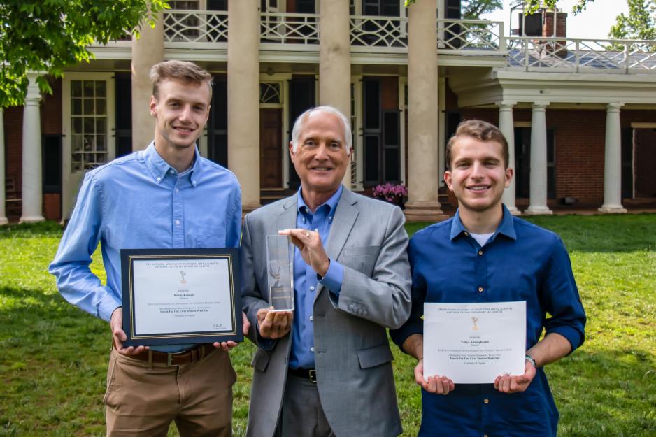 From left, Robby Keogh, Wyatt Andrews and Yahya Abou-Ghazala stand together holding their awards for a group photo