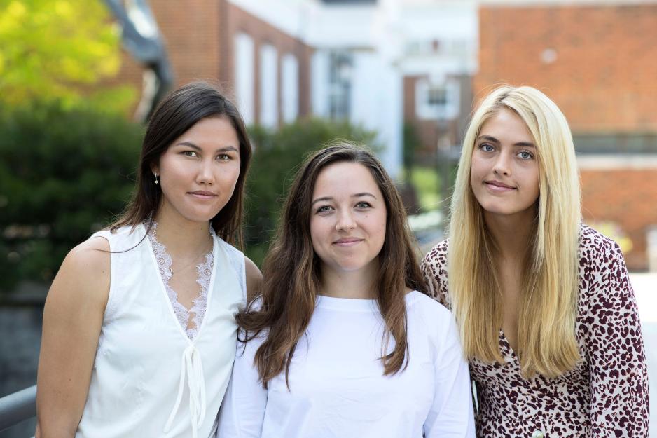 From left, Megan Eisenfelder, Sophie Wong and Magnolia “Maggie” Matthews  stand together for a picture