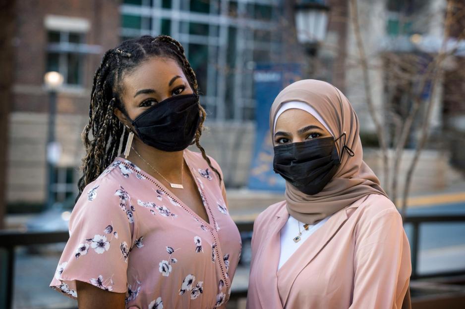 Milania Harris, left, and Zahra Alisa stand next to each other