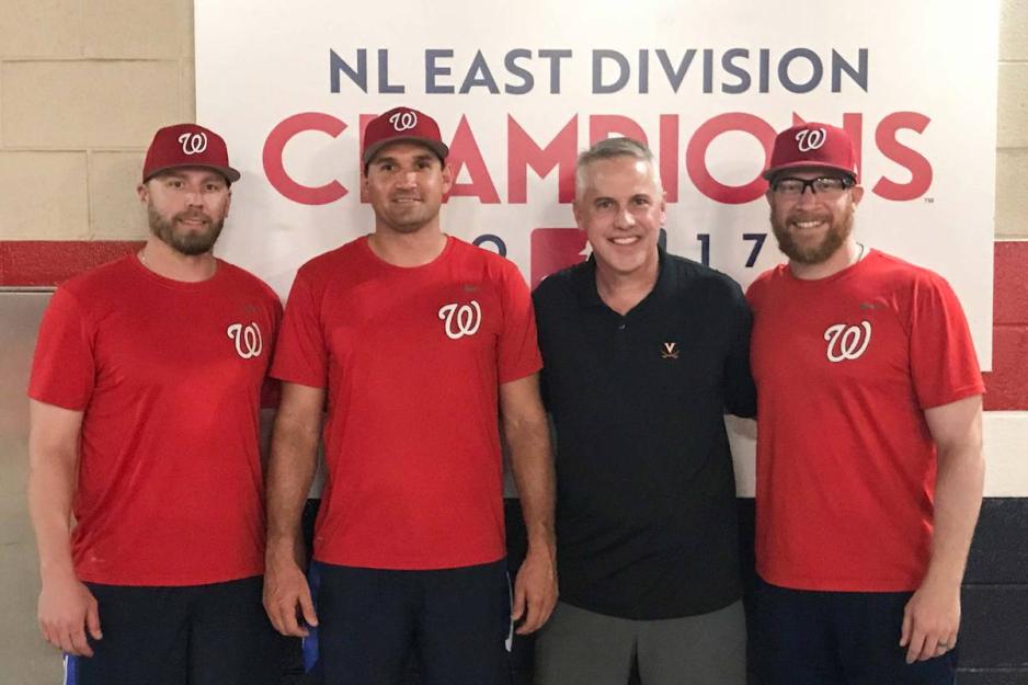 Ryan Zimmerman, second from left, and Sean Doolittle, far right, with UVA coach Brian O’Connor and  Mark Reynolds stand together for a photo