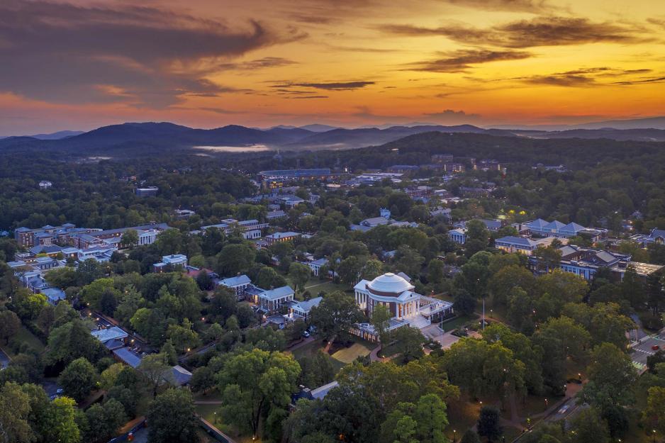 Aerial view of the Rotunda during a sunset that is orange yellow and blues