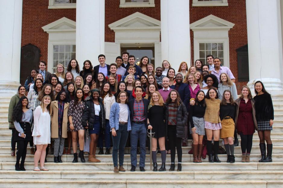 Phi Sigma Pi stand on the steps of the Rotunda for a group photo