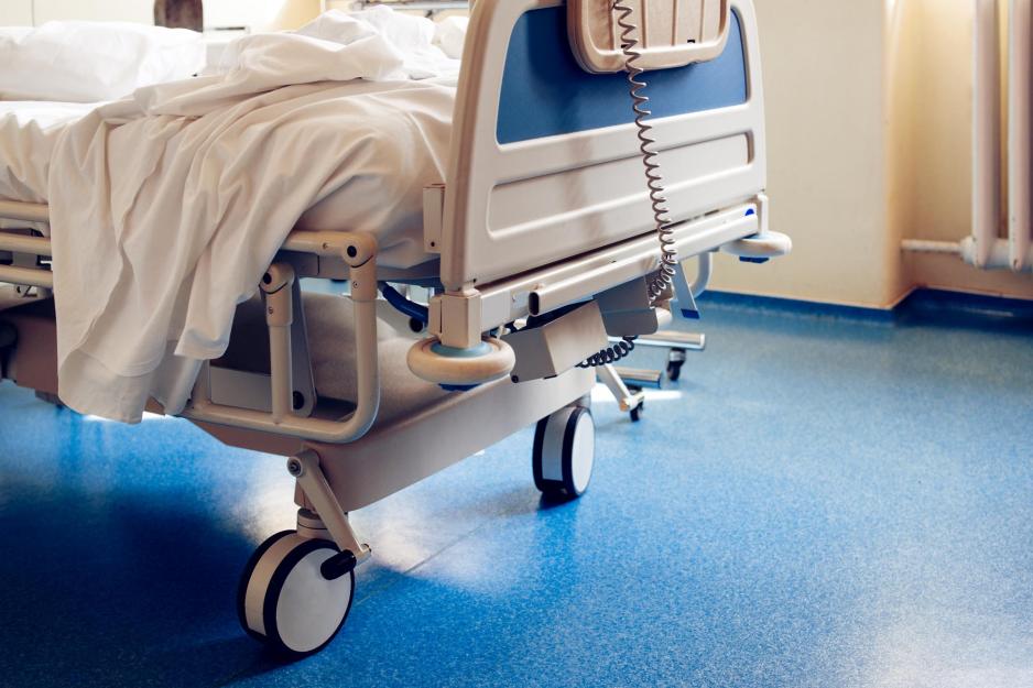 closeup view of the foot of a hospital bed