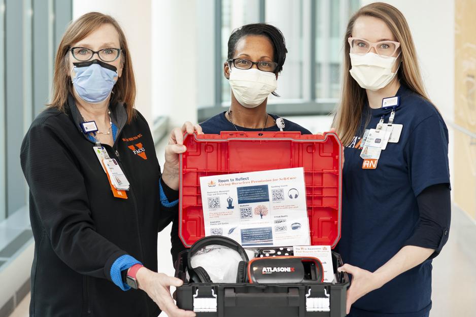 Left to right, Nancy Farish, Jeanell Webb-Jones and Jane Muir hold a resiliency toolkits