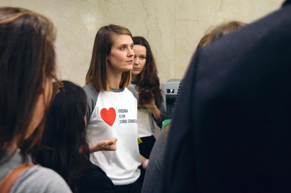 Julia Taylor speaks to a group of people 