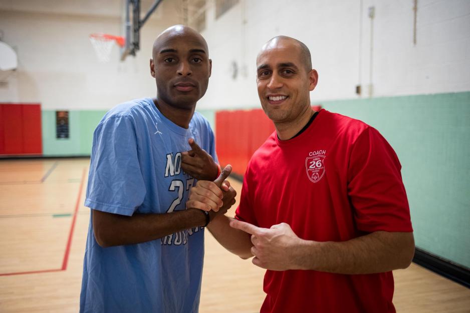 Emilio Alonso, right, Chris Carter, left, pose for the camera as the point fingers at each other