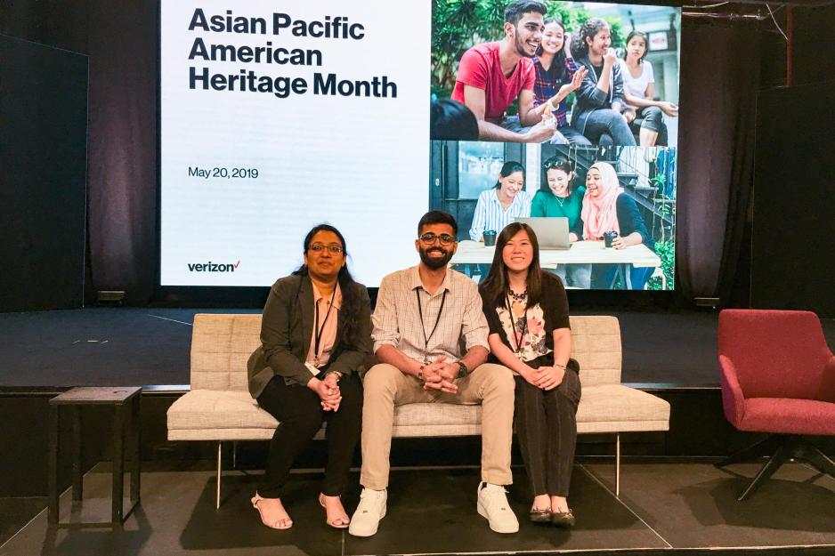From left, Madhura Shringare, Akshay Malik and Stephanie Chen sit on a couch together for a picture