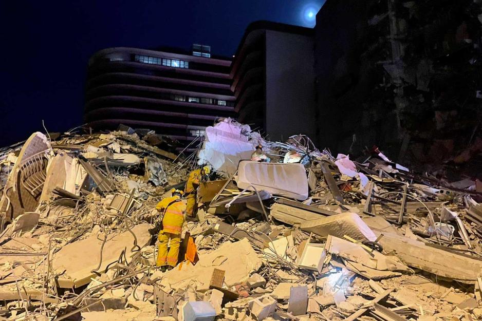 Rescuers digging through the Champlain Towers South reckage