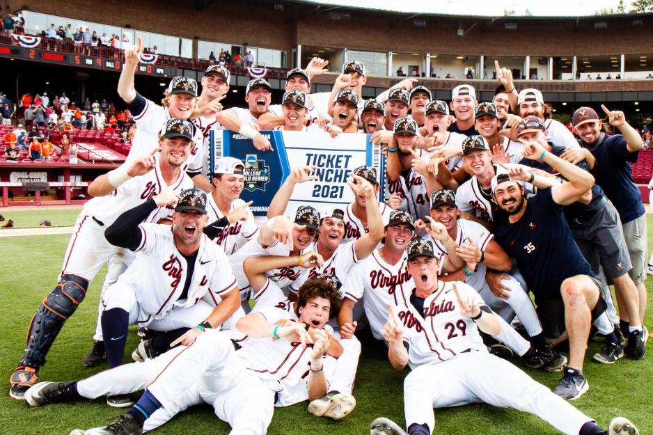 2021 UVA baseball team celebrates NCAA win with a celebratory group photo on the field