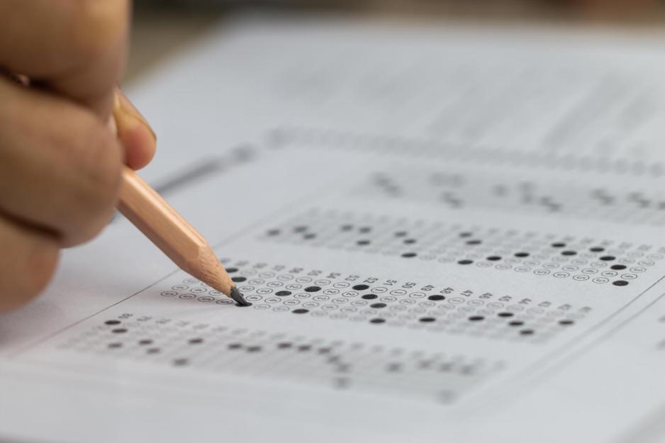 Person filling out a scantron
