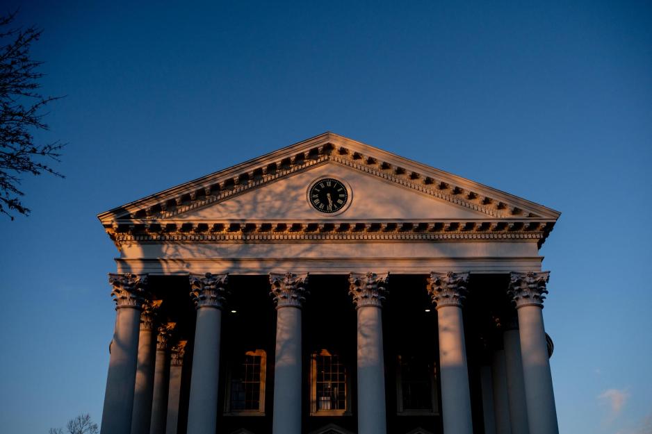 Front of the town hall building facing its tall white columns and clock