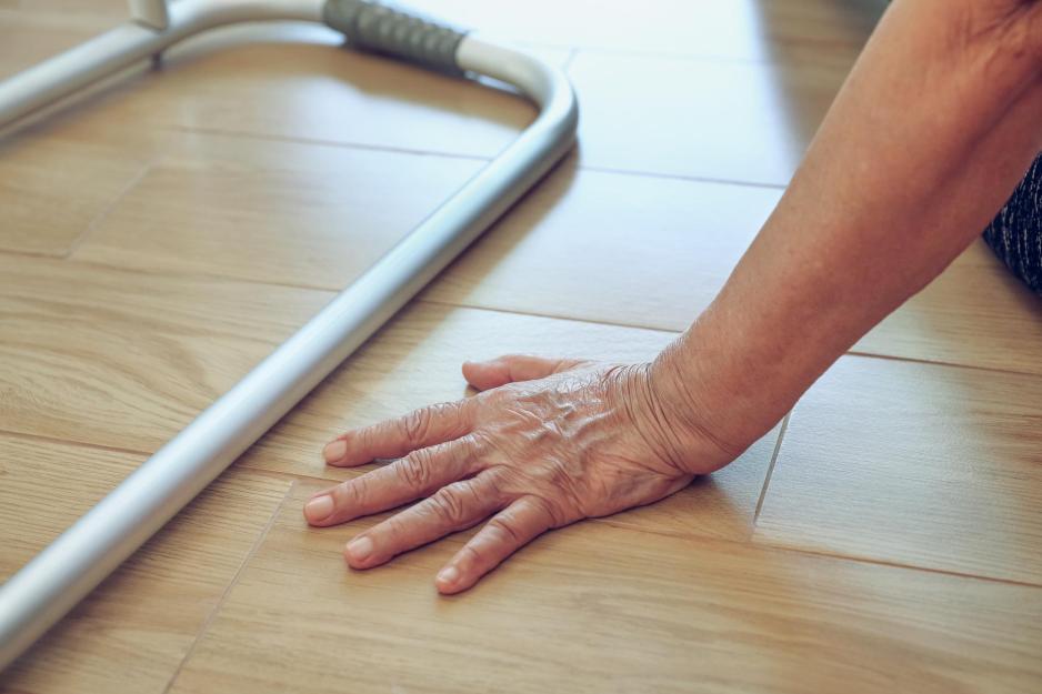 Person sitting on the floor exercising