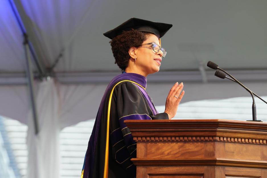 Melody Barnes standing at the podium during Final Exercises giving a speech