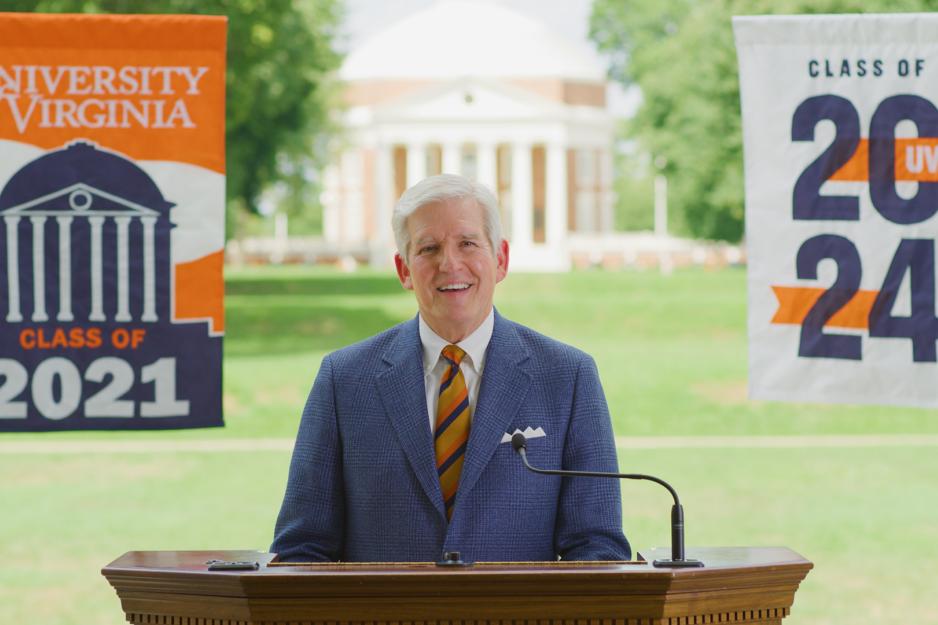 Man standing at a podium during 2021 virtual final exercises